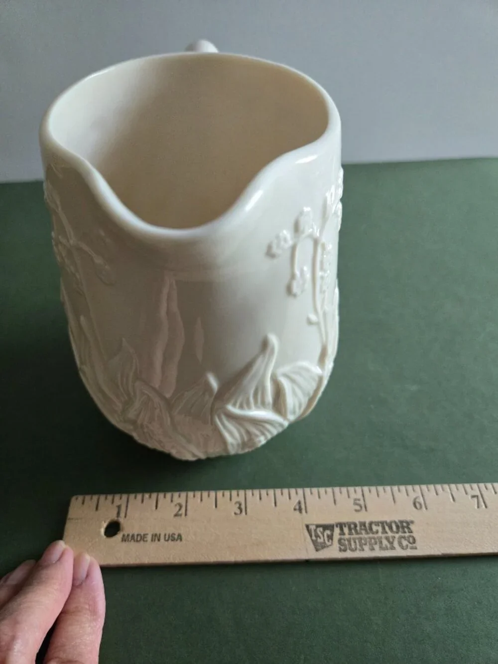Pair of Ivory Bisque Pitchers